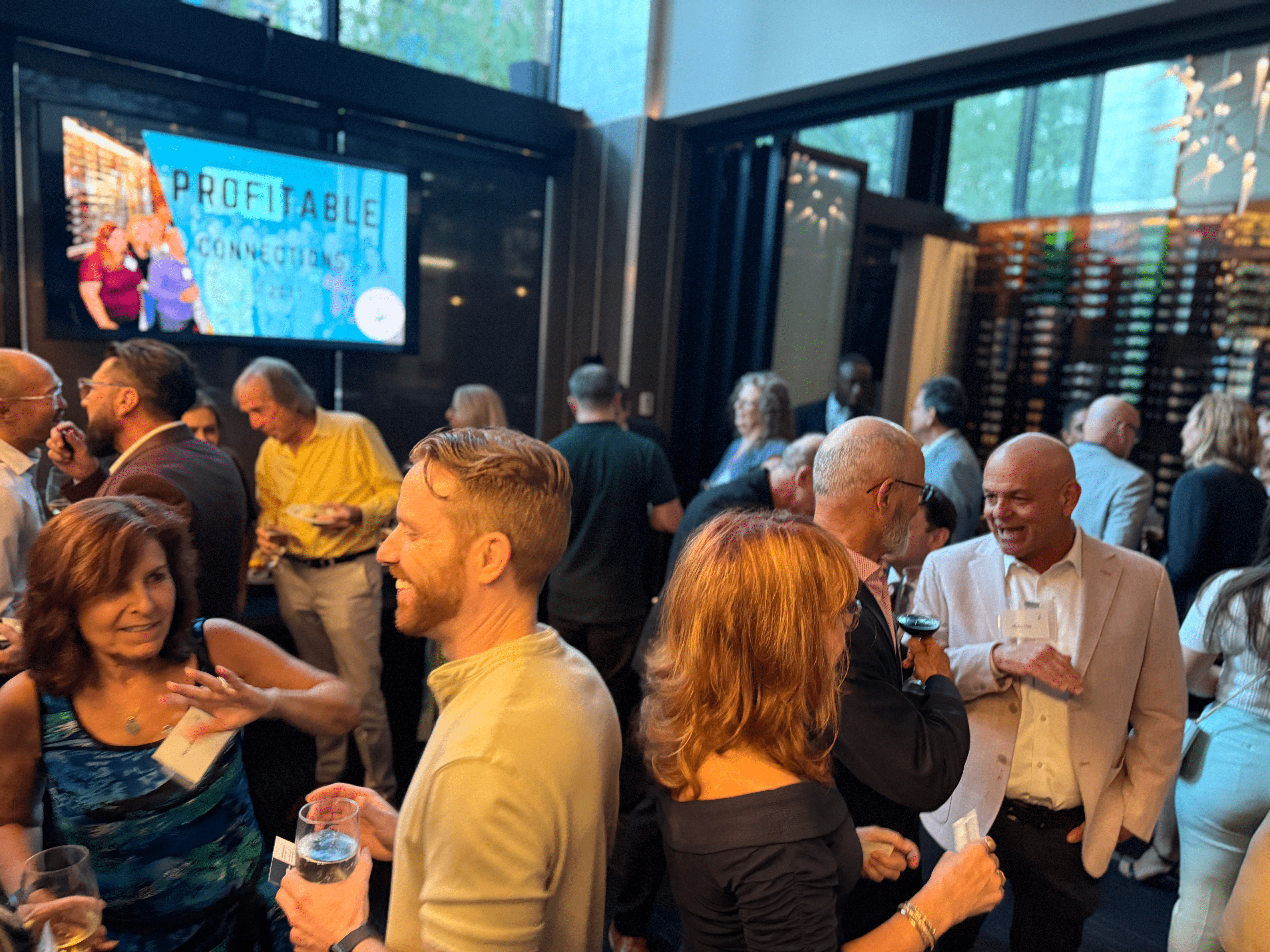 Business professionals at a Profitable Connections networking event