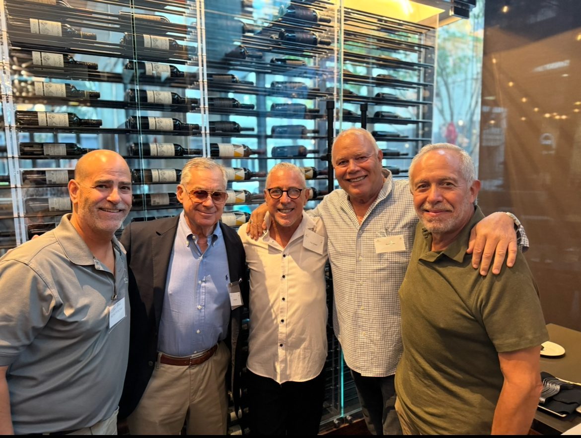 Group photo of attendees at a Profitable Connections networking event